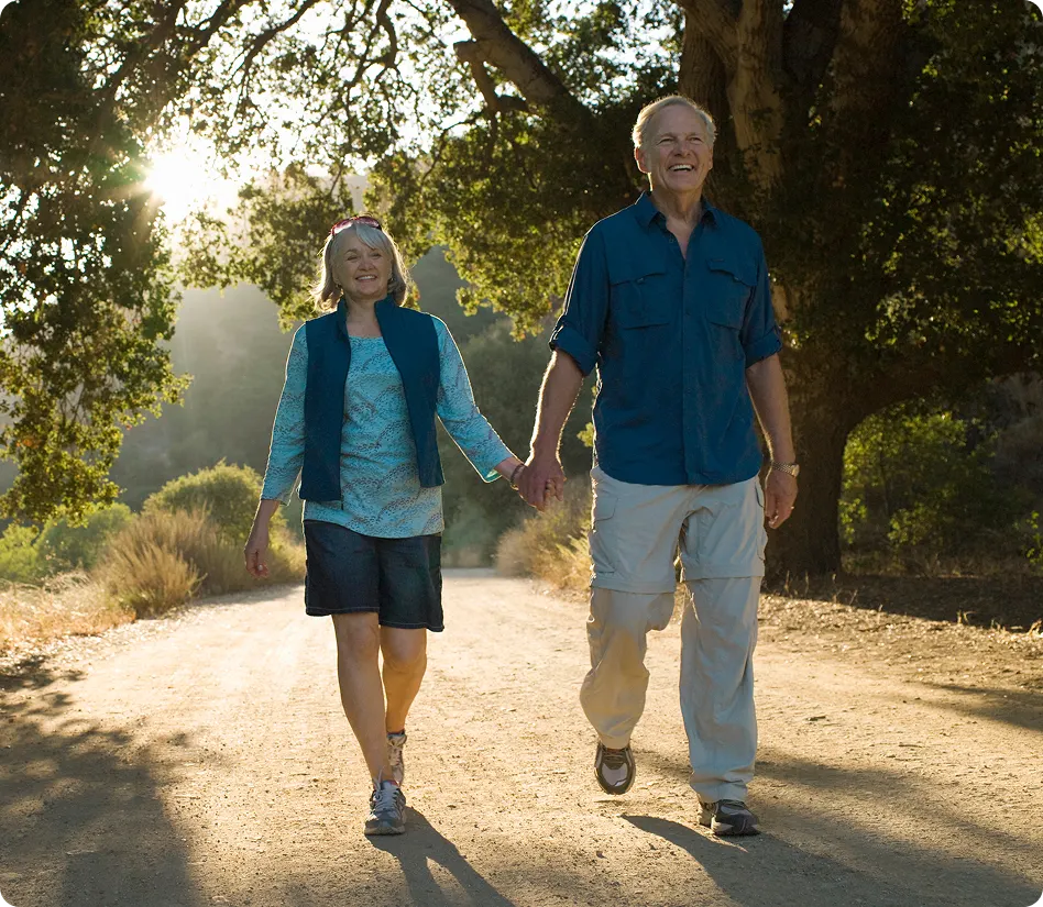 Happy couple strolling outdoors
